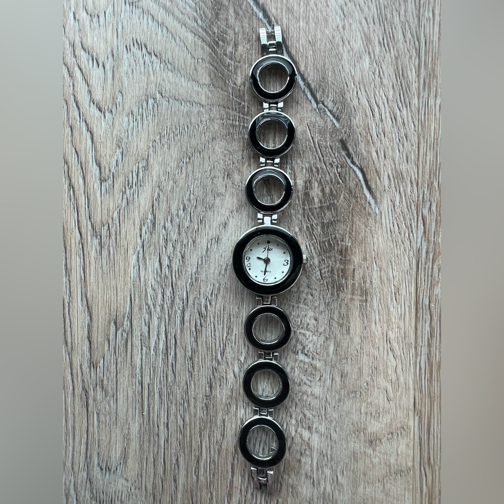 JW Sleek Black and Silver Circular Link Quartz Watch